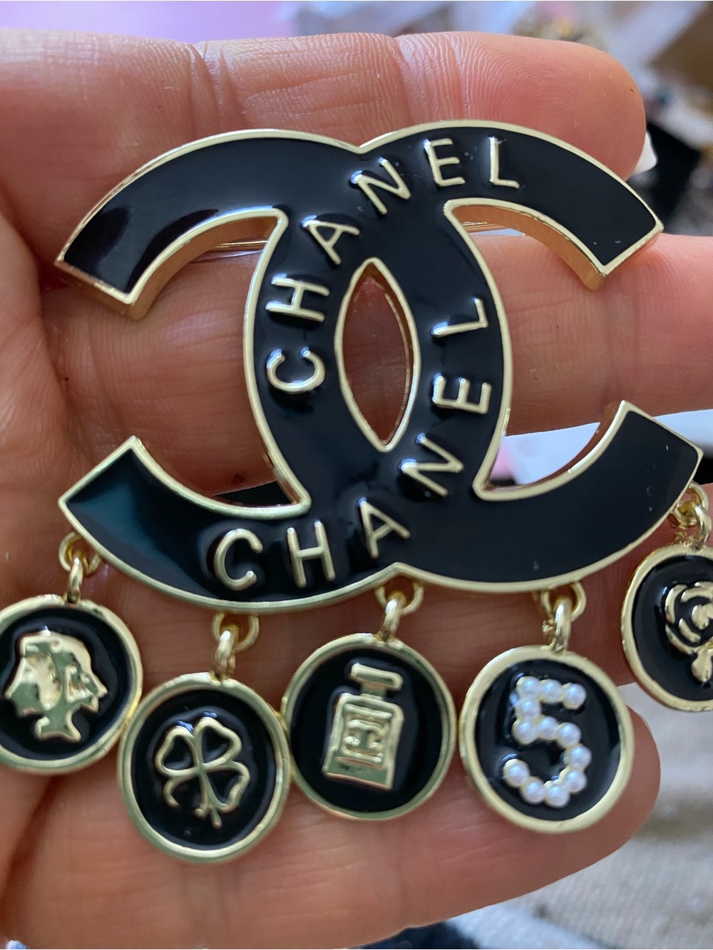 Unbranded Fashion Black and Gold Logo Dangle Brooch